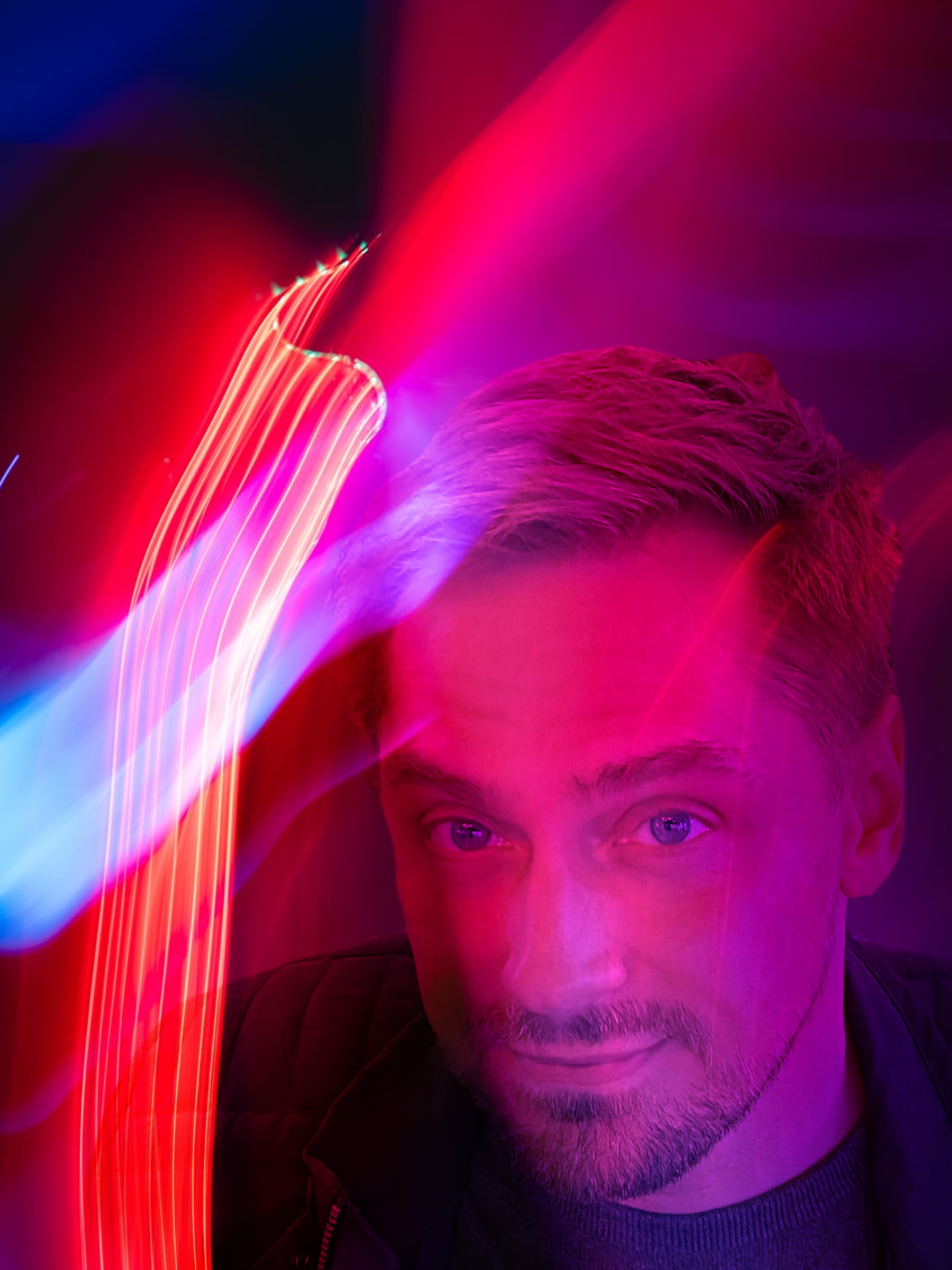 Jey Grey portrait with neon light trails